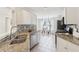 Stylish kitchen with stainless appliances, granite counters and a cozy breakfast nook at 1433 Chardin Dr, Marietta, GA 30062