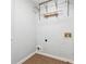 Unfinished laundry area with shelving and hookups, offering potential for customization at 1433 Chardin Dr, Marietta, GA 30062