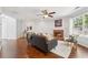 Comfortable living room featuring a fireplace, ample seating, and hardwood floors at 1433 Chardin Dr, Marietta, GA 30062