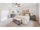 Spacious main bedroom featuring a tray ceiling, large windows, and neutral decor at 1433 Chardin Dr, Marietta, GA 30062