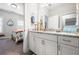 Bathroom with granite countertops, undermount sink, and beach themed decorations at 185 Vandiver Ct, Acworth, GA 30101