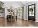Elegant dining room with hardwood floors, chandelier lighting, and stylish decor at 185 Vandiver Ct, Acworth, GA 30101