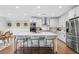 Modern kitchen with stainless steel appliances, a large center island and bar stool seating at 185 Vandiver Ct, Acworth, GA 30101