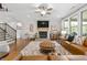 Inviting living room showcasing a stone fireplace, hardwood floors, and comfortable seating at 185 Vandiver Ct, Acworth, GA 30101