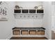 Well-organized mudroom with a bench seat, coat hooks, and storage cubbies at 185 Vandiver Ct, Acworth, GA 30101