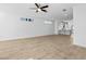 Spacious living room with wood floors, recessed lights and an open concept to the kitchen at 2842 Evanshire Ave # 113, Duluth, GA 30096