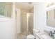 A well-maintained bathroom with tiled shower, granite countertop, and natural light at 4322 Glenwood Pkwy, Decatur, GA 30032