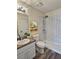 Modern bathroom featuring a subway tile shower, vanity, and updated fixtures at 4460 Branchwood Ct, Loganville, GA 30052