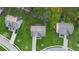 Aerial view of neighborhood, showing homes, yards, driveways, and landscaping at 4528 Venus Sw Ct, Powder Springs, GA 30127