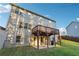 Two story home with a deck, a walk out basement, and backyard at 4528 Venus Sw Ct, Powder Springs, GA 30127