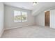 Bedroom with carpet, a window overlooking the neighborhood, and an attached closet at 4528 Venus Sw Ct, Powder Springs, GA 30127