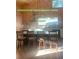 Modern kitchen features an island with bar seating and stainless steel appliances at 639 Hall Station Rd, Kingston, GA 30145