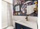Stylish bathroom with modern vanity, unique wallpaper, and ample lighting at 1355 Euclid Ne Ave # 15A, Atlanta, GA 30307