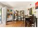Bright dining room with hardwood floors, and access to outdoor patio, complete with a dining table and stylish decor at 1355 Euclid Ne Ave # 15A, Atlanta, GA 30307