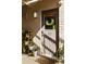 Charming home entrance with a decorative wreath and potted plants at 1355 Euclid Ne Ave # 15A, Atlanta, GA 30307