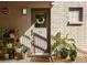 Charming home entrance with a decorative wreath and potted plants at 1355 Euclid Ne Ave # 15A, Atlanta, GA 30307