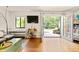 Cozy living room features hardwood floors, natural light, access to the backyard, and comfortable seating at 1355 Euclid Ne Ave # 15A, Atlanta, GA 30307