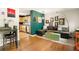 Comfortable living room connected to the kitchen, featuring hardwood floors, stylish decor, and plenty of natural light at 1355 Euclid Ne Ave # 15A, Atlanta, GA 30307