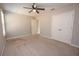 Bedroom with a neutral color palette, large double door closet, and bright natural light at 2034 W Hampton Dr, Canton, GA 30115