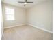 Bedroom with carpet, ceiling fan, and natural light from the window at 2034 W Hampton Dr, Canton, GA 30115
