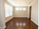 Spacious dining room with hardwood floors and a chandelier, great for Gathering gatherings at 2034 W Hampton Dr, Canton, GA 30115