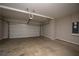 Clean, empty garage with ample space for parking and storage solutions at 2034 W Hampton Dr, Canton, GA 30115