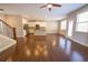 Spacious open-concept living and kitchen area with hardwood floors and abundant natural light at 2034 W Hampton Dr, Canton, GA 30115