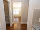 Walk-in pantry with shelving, near the kitchen area and dining room at 2034 W Hampton Dr, Canton, GA 30115