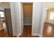 Walk-in pantry has shelving for storage with easy access from the kitchen at 2034 W Hampton Dr, Canton, GA 30115