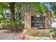The condominiums of Rockbridge Park signage surrounded by beautiful landscaping at 233 Cobblestone Trl, Avondale Estates, GA 30002