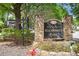 Condominiums of Rockbridge Park community sign framed by trees and manicured landscaping at 233 Cobblestone Trl, Avondale Estates, GA 30002