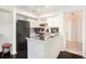 Kitchen featuring functional layout, white cabinets, and essential appliances at 233 Cobblestone Trl, Avondale Estates, GA 30002