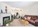 Comfortable living room featuring a fireplace and plush seating at 233 Cobblestone Trl, Avondale Estates, GA 30002