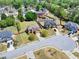 Aerial shot showcases a lovely home in a neighborhood setting with well-maintained yards at 2424 Malden Park Dr, Buford, GA 30519