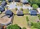 Expansive lawn with solar panels and privacy fence, showcasing neighborhood at 2424 Malden Park Dr, Buford, GA 30519