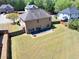 Large, fenced backyard with patio perfect for outdoor gatherings at 2424 Malden Park Dr, Buford, GA 30519