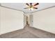 An airy bedroom with neutral walls, carpeted flooring and a ceiling fan with wooden blades at 2424 Malden Park Dr, Buford, GA 30519
