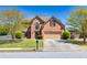 Charming two-story brick home with well-maintained landscaping, a two car garage, and inviting curb appeal at 2424 Malden Park Dr, Buford, GA 30519