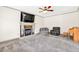 Bright living room features a fireplace and neutral carpet at 2424 Malden Park Dr, Buford, GA 30519