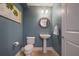 Bathroom featuring a pedestal sink and updated fixtures at 200 River Vista Dr # 423, Atlanta, GA 30339