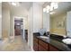 Full bathroom with walk-in closet featuring granite counters at 200 River Vista Dr # 423, Atlanta, GA 30339