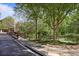 The community features a wooden bridge and scenic walking path for residents at 200 River Vista Dr # 423, Atlanta, GA 30339