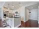 Bright kitchen with stainless steel appliances, modern lighting, and breakfast bar at 200 River Vista Dr # 423, Atlanta, GA 30339