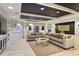 Spacious lounge area with stylish sectional sofa, designer rug, and contemporary decor at 200 River Vista Dr # 423, Atlanta, GA 30339