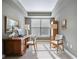 Bright office space with wood desk, neutral walls, and natural light at 200 River Vista Dr # 423, Atlanta, GA 30339