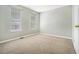 Bedroom with a closet and multiple windows offering natural light at 3455 Kingsbrooke Way, Decatur, GA 30034
