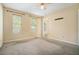 Spacious bedroom features two large windows, neutral walls, and ceiling fan at 3455 Kingsbrooke Way, Decatur, GA 30034