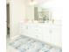 Bright bathroom featuring double sinks, ample counter space, and modern fixtures at 3495 Delegate Aly, Scottdale, GA 30079