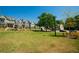 A view of the well-manicured lawns and the charming homes in this community at 3495 Delegate Aly, Scottdale, GA 30079