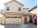 Charming two-story home with a two-car garage and inviting front entrance at 3495 Delegate Aly, Scottdale, GA 30079